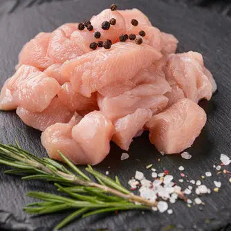 Diced boneless chicken pieces in a tray – Uncle Beef Butchers