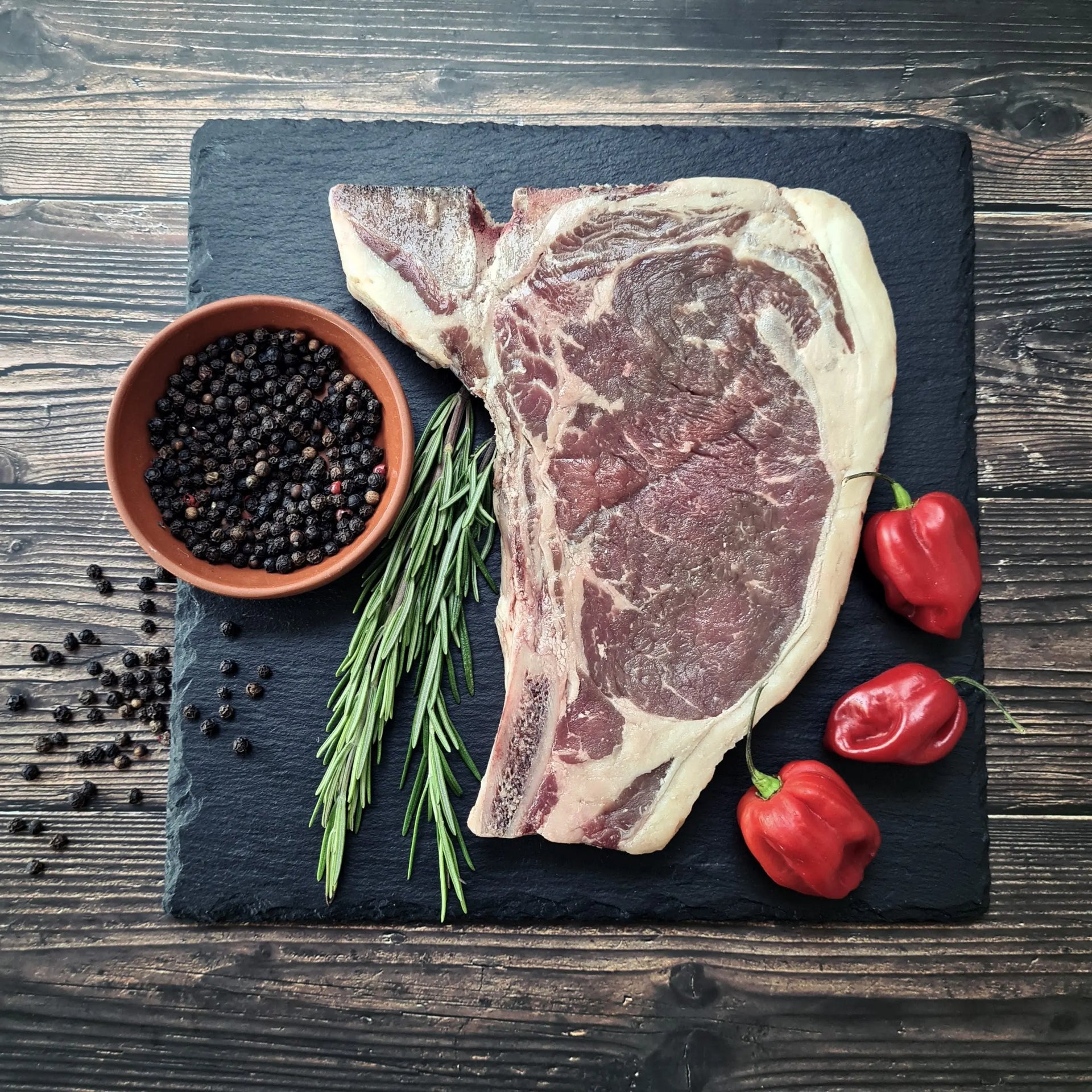 Bone-in sirloin steak well seared with a golden fat cap, ready to slice – Uncle Beef Butchers