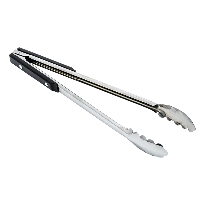 Long stainless-steel braai tongs gripping a steak over hot coals on a barbecue