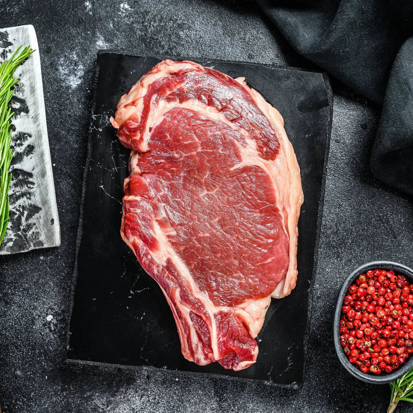 Cowboy steak (bone-in ribeye) thick-cut and well seared, ready to carve – Uncle Beef Butchers