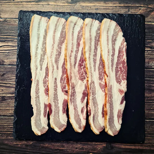 Dry cured streaky unsmoked bacon fried until evenly crisp with golden edges, ready for a BLT or full English