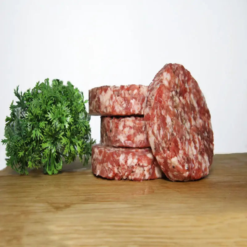 Fillet and bone marrow beef burger patties seared on a hot griddle – Uncle Beef Butchers