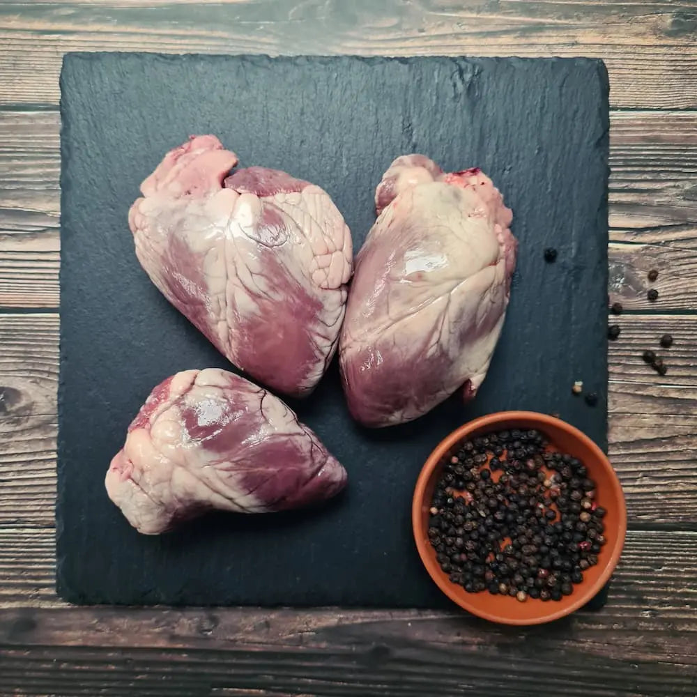 Lamb hearts trimmed and sliced across the grain, ready for a quick sear or skewers – Uncle Beef Butchers