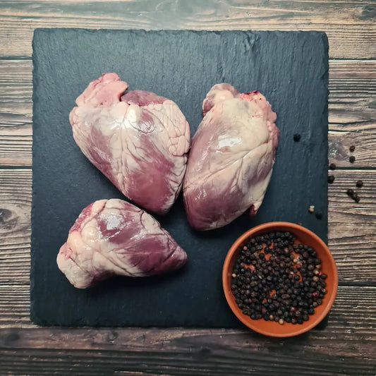 Lamb hearts trimmed and sliced across the grain, ready for a quick sear or skewers – Uncle Beef Butchers