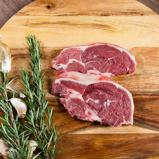 Lamb rump steaks seared to a golden crust with a blushing centre, sliced across the grain – Uncle Beef Butchers