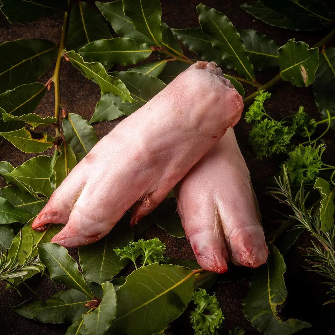 Pigs trotters braised until tender in an aromatic stock, served with glossy, reduced jus – Uncle Beef Butchers