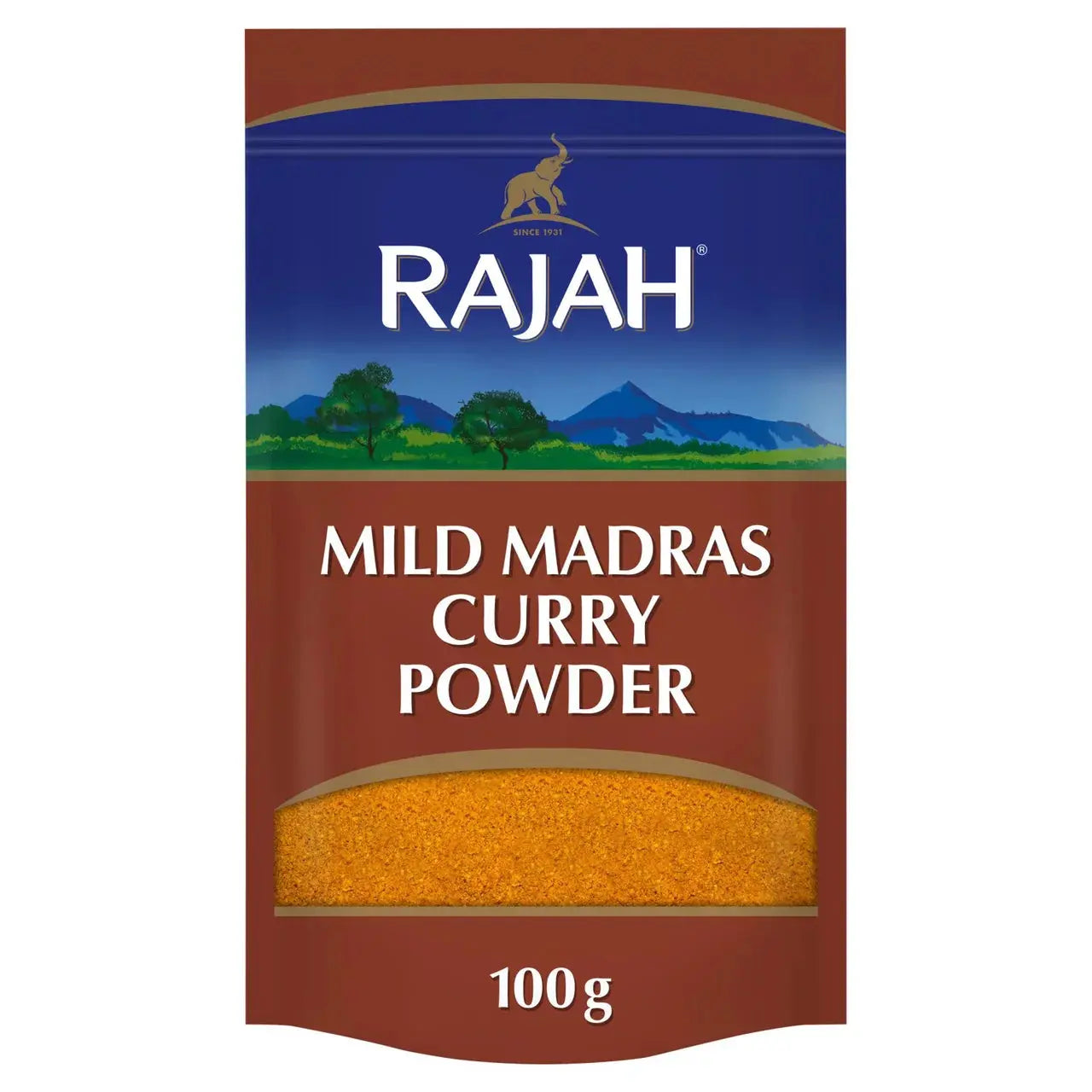 Rajah Curry Powder shaker beside a pan of fragrant chicken curry with fresh coriander