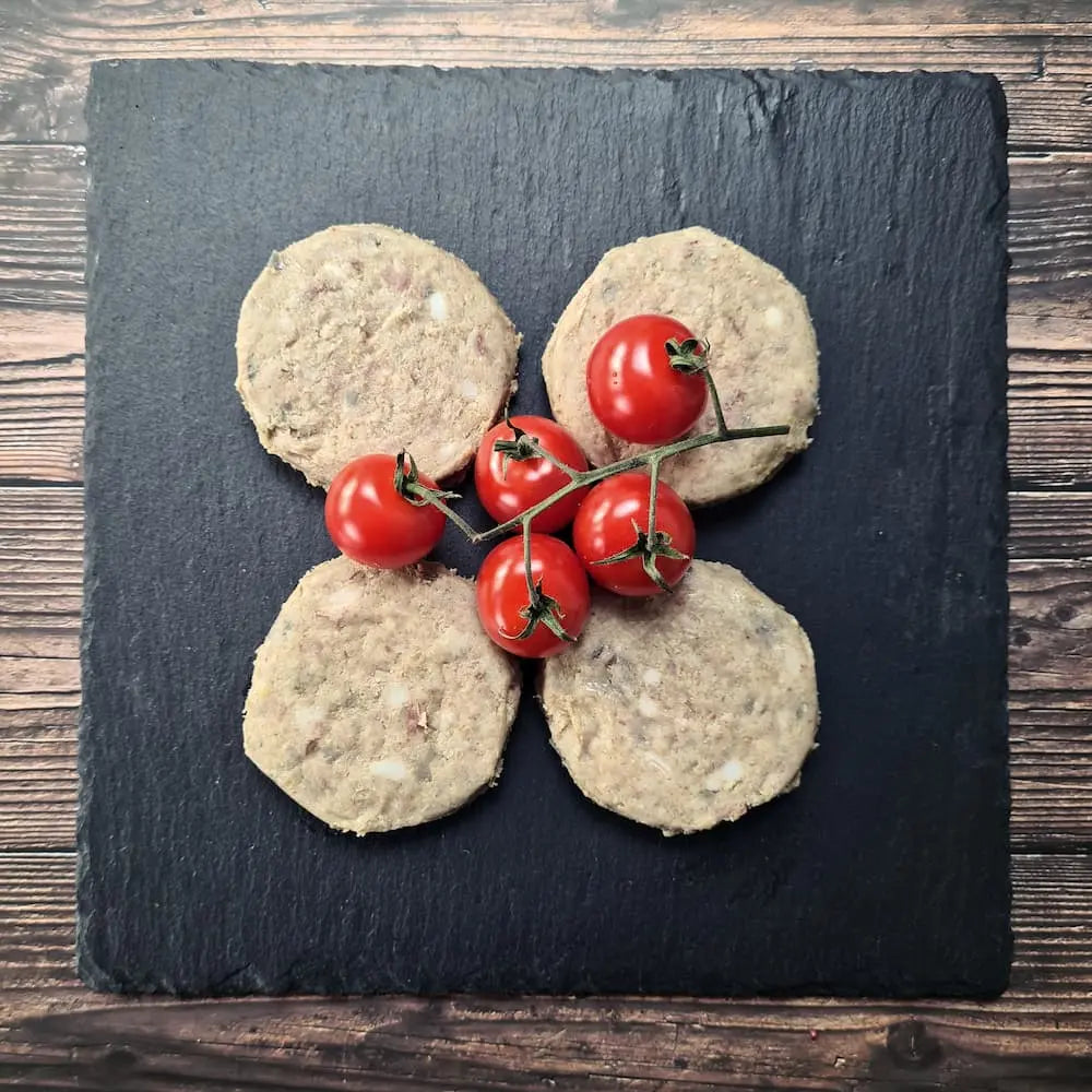 Slices of white pudding fried until golden and crisp, served with eggs and toast